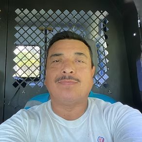Enrique, professional painter at Impact Painting.